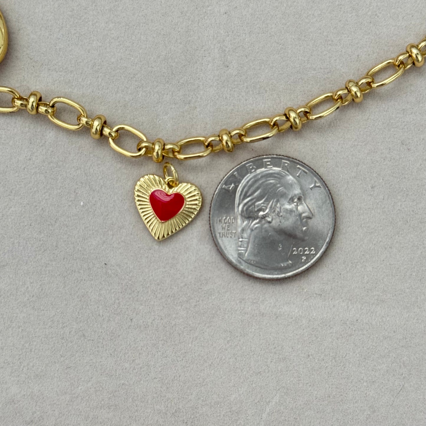 Red heart inside charm