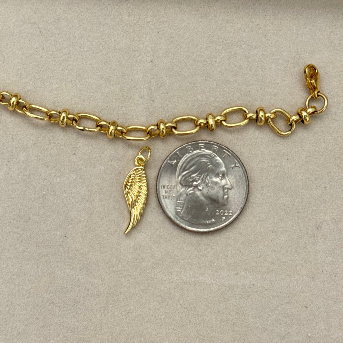 Angel wing charm