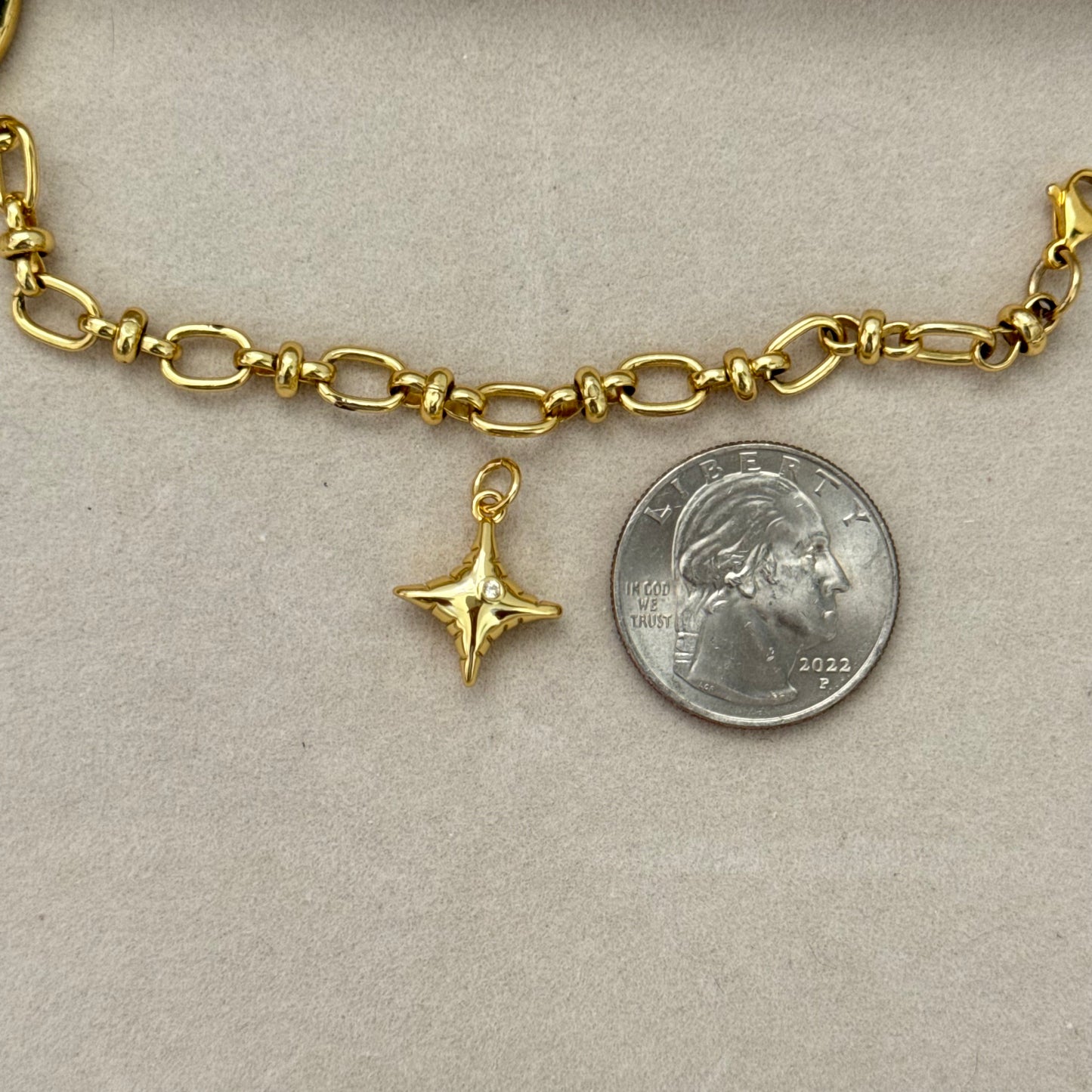 Golden star charm